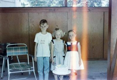 Children with a birthday cake