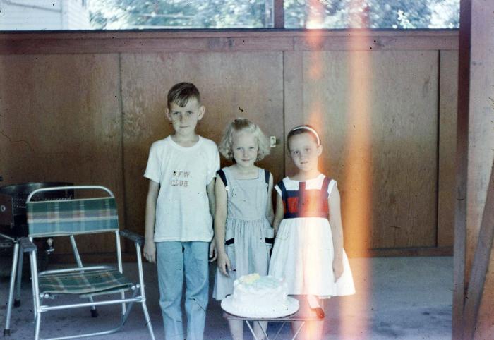 Children with a birthday cake