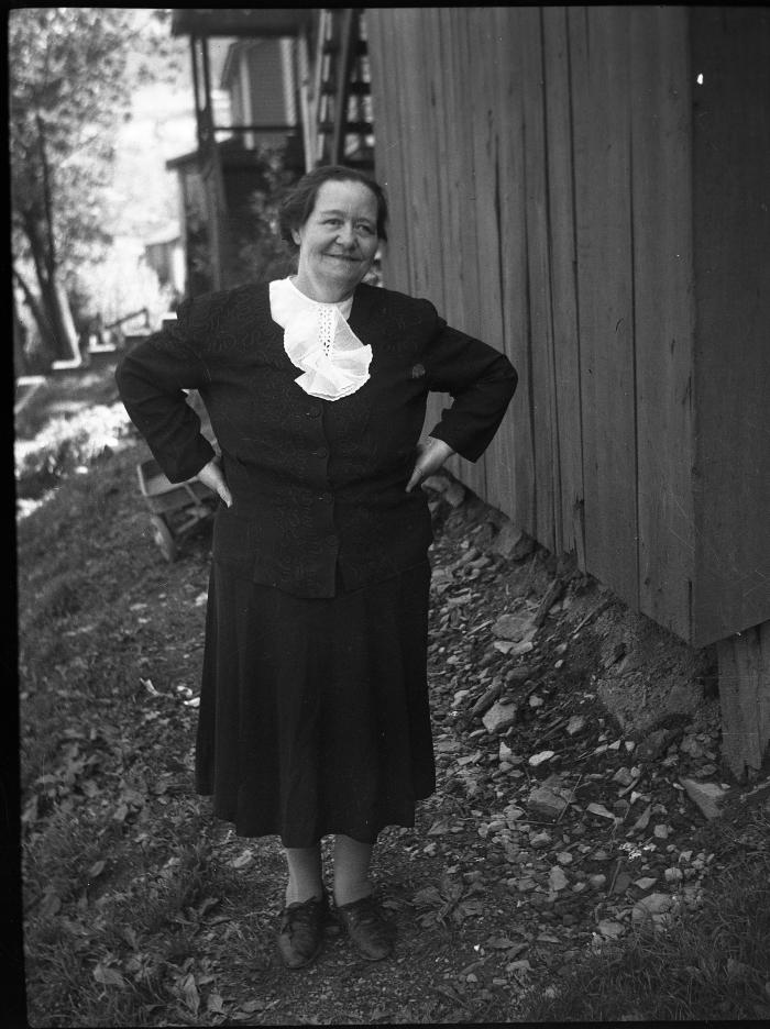Woman posing for a photo outdoors