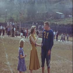 High school football game with cheerleaders (silent)