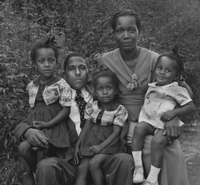 African American couple with three of their daughters