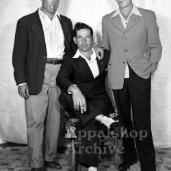 Studio portrait of 3 men in suits