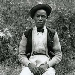 Exterior portrait of young man in hat