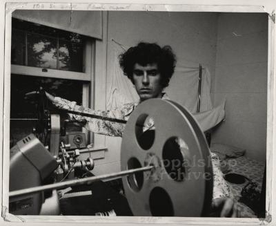 Man [Ben Zickafoose] at rewind table - Coal Miner: Frank Jackson production still