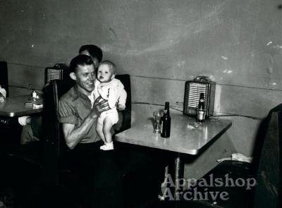 A man holding a baby