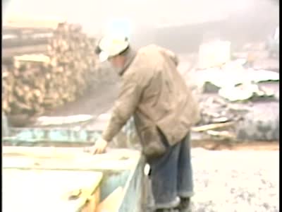 Footage outside coal mine, shift change