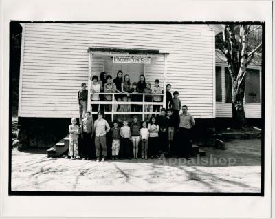  Production still of children in front of school - Kingdom Come School