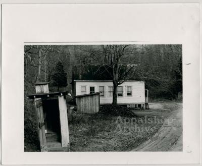 Production still of school building - Kingdom Come School